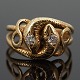 A ring set with 2 diamonds mounted in 14k gold, a snake