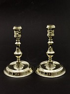 A pair of Naestved brass candlesticks