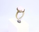 Gilded ring of 
925 sterling 
silver 
decorated with 
large pale pink 
stone and 
stamped Krzi.
Size ...