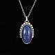 Georg Jensen. 
Silver Pendant 
#9B with 
Sodalite and 
Rock Crystal - 
Limited 
Edition.
Design by ...