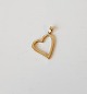 Heart pendant 
in 8ct gold. 
Stamp: 333 - 
SC 
Dimensions 19 
x 22 MM.