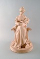 Adda Bonfils (1883-1943) for Ipsens Enke. Stor terracotta skulptur af mor med 
barn. Dateret 1911.