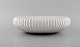 Michael Andersen. Large bowl in white glazed ceramics. Ribbed design, 1960