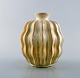 Vicke Lindstrand for Upsala-Ekeby. Organic vase in glazed stoneware. Beautiful 
glaze in yellow and white shades. Ribbed design, 1950