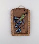 Swedish ceramist. Glazed ceramic wall plaque with bird motif. 1960