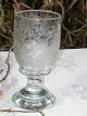 Beautiful old 
glass, with 
decoration. 
Height 14,3 
cms. Diameter 
6,3 cms. Fine 
condition. Ca 
1850.