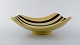 Gabriel 
Keramik, 
Sweden. 
"Tropik" dish 
in glazed 
ceramics. 
Striped design 
in yellow black 
glaze. ...