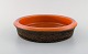 Mari Simmulson 
for 
Upsala-Ekeby. 
Dish in glazed 
stoneware. 
Glaze in brown 
and orange 
shades. ...