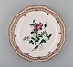 Royal Copenhagen Flora Danica openwork dinner plate. Dated 1956.
25,5 cm. in diameter.