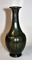 Art deco Vase, 
Just Andersen, 
no. 2360, 
Denmark. Green 
patinated disco 
metal. H.: 17 
cm.
NB: ...