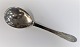 Georg Jensen. 
Silver cutlery 
(830). Beaded. 
Serving spoon. 
Length 25,5 cm. 
Produced 1927