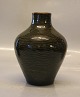 20824 RC Vase 
17 cm  Axel 
Salto October 
1948 Ribbed 
"living Stones" 
green olivin 
glaze Royal ...