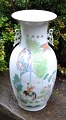 Large Chinese 
porcelain floor 
vase, 19th 
century. 
Paintings in 
the form of 
people in 
landscape. ...