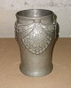 Mogens Ballin's 
successor: Vase 
in pewter with 
decoration with 
garlands of 
foliage in 
relief. ...