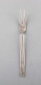 Tias Eckhoff 
for Georg 
Jensen. 
"Cypress" meat 
fork in 
sterling 
silver.
Measures: 21 
cm.
In ...