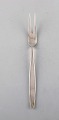 Tias Eckhoff 
for Georg 
Jensen. 
"Cypress" meat 
fork in 
sterling 
silver.
Measures: 21 
cm.
In ...