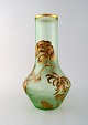 Montjoye, France. Large art nouveau vase in mouth-blown art glass. Decorated 
with flowers in enamel work, gilt. High quality vase. Dated 1880-1900.