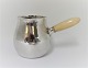 Georg Jensen. 
Silver milk 
jug. Sterling 
(925). Model 
80B. Design 
Georg Jensen. 
Height 9 cm. 
...