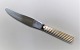 Georg Jensen. 
Bernadotte 
silver cutlery. 
Sterling (925). 
Lunch knife 
old. model. 
Length 20.2 cm.