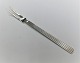 Georg Jensen. 
Bernadotte 
silver cutlery. 
Sterling (925). 
Cold cuts Fork. 
Length 15 cm.
