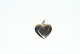 Heart pendant 
in 14 carat 
gold
Height 25.63 
mm
Wide 19.69 mm
Thickness 4.21 
mm
Nice and well 
...