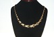 Elegant 
necklace with 
course in 14 
carat gold
Stamped SOZER 
585
Length 42.5 cm
Wide ...