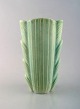 Rörstand. Art deco vase in glazed ceramics. Beautiful delicate light green 
glaze. Mid 20th century.