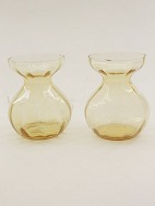 A pair of Holmegrd yellow hyacinth glass