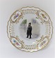 Royal 
Copenhagen. 
Plate with 
open-work 
border. 
Diameter 19 cm. 
Motiv; police 
officer. 
Produced ...