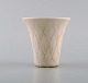 Gunnar Nylund 
for Rörstrand. 
Miniature vase 
in glazed 
ceramics. 
Beautiful 
eggshell glaze. 
...