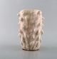 Axel Salto for Royal Copenhagen. Early vase in budding style. Beautiful eggshell 
glaze in pink and cream tones. 1940
