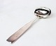 Large serving 
spoon in 
heritage silver 
no. 2 by Hans 
Hansen.
31 cm.