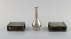 Just Andersen. 
Two matchbox 
holders and a 
vase in pewter. 
1930's.
In good 
condition with 
minor ...