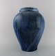 Hegnetslund Lervarefabrik, Denmark. Large hanging vase in glazed ceramics. 
Beautiful blue running glaze. 1950 / 60