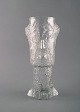 Eugen Montelin 
for Reijmyre 
glass. "Birch 
stub" vase in 
clear art 
glass. Dated 
1974.
Measures: ...