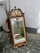 Mirror of oak 
with gildings 
19. Century H. 
110 cm B. 41 
cm.