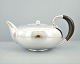 Georg Jensen 
silver teapot. 
Johan Rohde 
for Georg 
Jensen; A 
teapot of 
sterling 
silver.
Georg ...