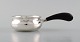 Danish silversmith. Butter pot in silver (830) with ebony handle. Dated 1947.
