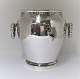Georg Jensen. 
Mappin & Webb. 
Silver plated 
champagne 
cooler. This is 
designed and 
used at the ...