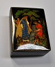 Russian lacquer 
box, 1965. 
Hand-painted. 
Decorated from 
a folk 
adventure. 
Signed. 4 x 7.8 
x 9.6 ...