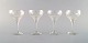 Bjørn Wiinblad (1918-2006) for Rosenthal. Four "Lotus" glasses in clear art 
glass decorated with lotus flower. 1980
