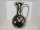 Royal 
Copenhagen art 
pottery, large 
pitcher 
designed by 
Mogens 
Andersen.
Decoration 
number ...