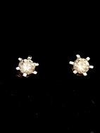 10 carat white gold ear stick with diamond 0.20 carat. 