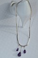 Necklace 
sterling silver 
pendant with 3 
amethysts. By 
silversmith: 
N.E. From A / S 
Nakskov ...