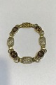 Just Andersen 
14K Gold 
Bracelet with 
Smoke coloured 
Topas Measures 
L 18.5 cm(7 
9/32 in)Weight 
...