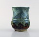 Møller & Bøgely, Denmark. Art nouveau vase in glazed ceramics. Beautiful glaze 
in brown and blue shades. 1917-1920. 
