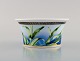 Gianni Versace for Rosenthal. "Jungle" porcelain bowl with gold decoration and 
green leaves. Late 20th century.
