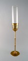 Bjørn Wiinblad 
(1918-2006). 
Tall 
"Hurricane" 
candle holder 
in brass with 
blue tinted 
glass. ...