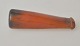 Cigar amber 
tip, 19th 
century.Sanded. 
L.: 6.5 m.