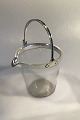 English Ice 
bucket with 
Sterling Silver 
mountings 
Measures( at 
spout) 14.4 
cm(5 45/64 in)